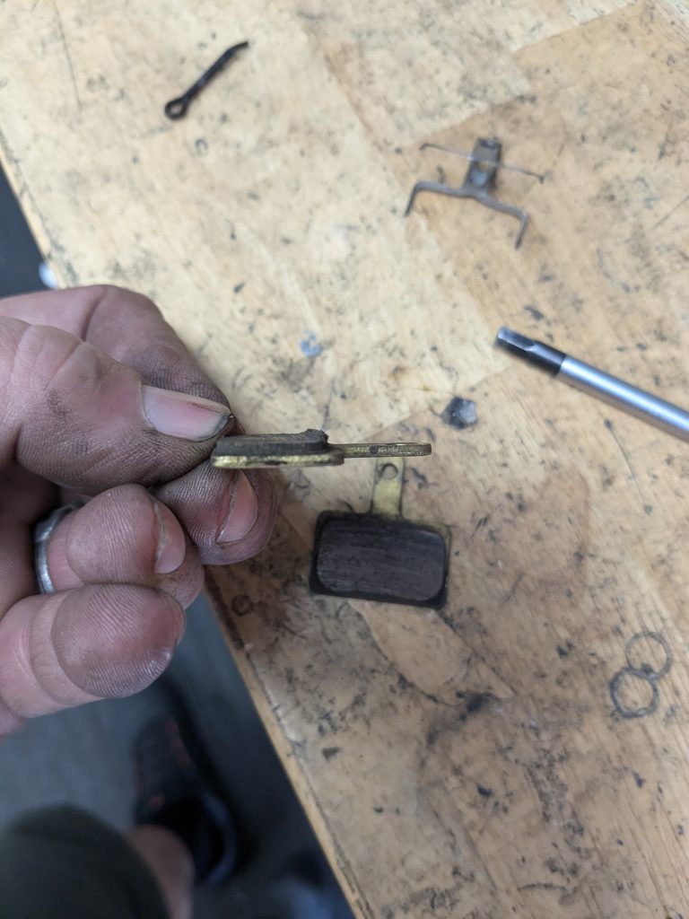 This is a single side of a brake pad failure.